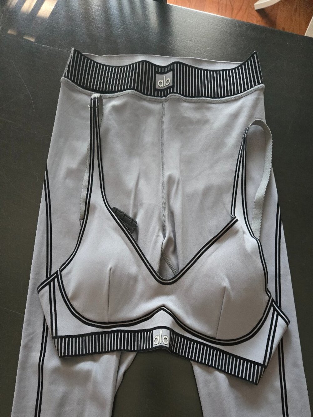 ALO Yoga set: matching leggings and sports bra in gray and black